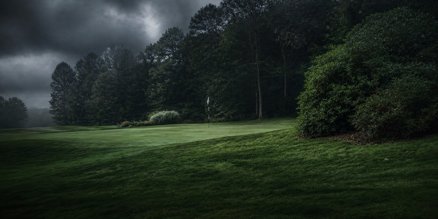 Stormy golf course green at Triple Lakes